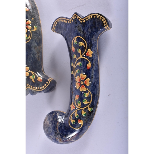 471 - A SET OF FIVE MIDDLE EASTERN QAJAR LACQUER HARDSTONE DAGGER HANDLES overlaid with foliage and vines.... 