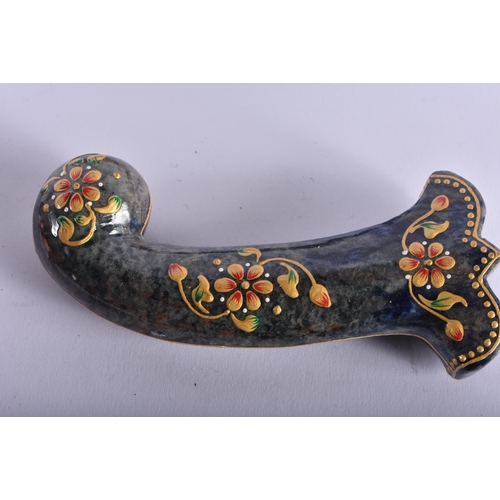 471 - A SET OF FIVE MIDDLE EASTERN QAJAR LACQUER HARDSTONE DAGGER HANDLES overlaid with foliage and vines.... 