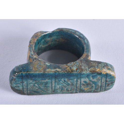 488 - AN ANCIENT EGYPTIAN FAIENCE GLAZED RING 664-332 BC. 4 cm x 3 cm.