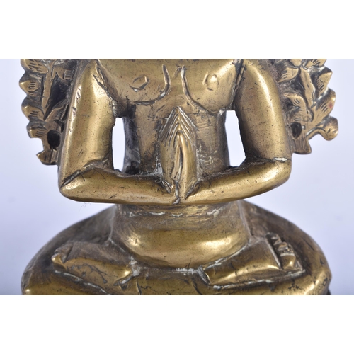 498 - A 17TH/18TH CENTURY INDIAN BRONZE FIGURE OF A SEATED MALE DEITY modelled with hands clasped. 12 cm x... 