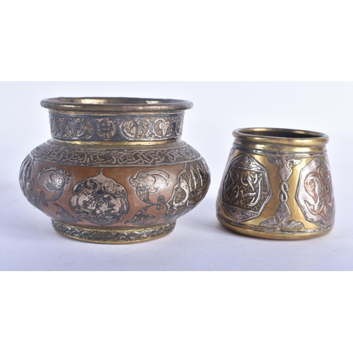 499 - TWO 19TH CENTURY ISLAMIC SILVER INLAID MIDDLE EASTERN BRONZE CENSERS decorated with calligraphy and ... 