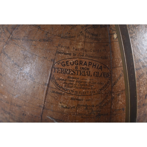 505 - AN ANTIQUE GEOGRAPHIA 6 INCH TERRESTRIAL GLOBE 55 Fleet Street London. 34 cm x 14 cm.