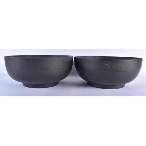 538 - A RARE LARGE PAIR OF LATE 18TH CENTURY WEDGWOOD BLACK BASALT PUNCH BOWLS of plain elegant form. 30cm... 