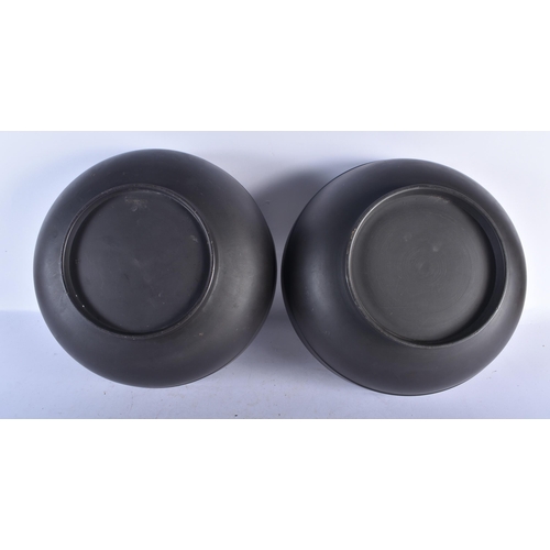 538 - A RARE LARGE PAIR OF LATE 18TH CENTURY WEDGWOOD BLACK BASALT PUNCH BOWLS of plain elegant form. 30cm... 