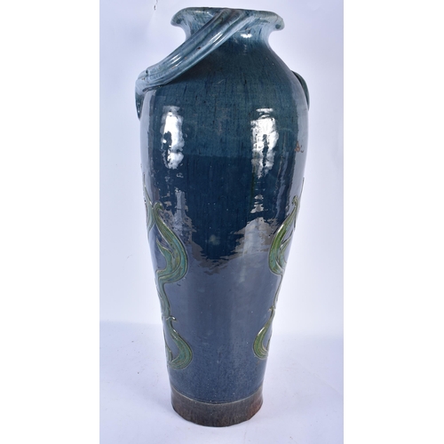 546 - A VERY LARGE ART NOUVEAU PAINTED POTTERY FLOOR VASE Attributed to Brannam. 60 cm x 18cm.