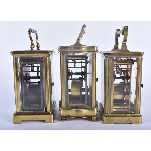 558 - THREE ANTIQUE FRENCH BRASS CARRIAGE CLOCKS 14.25cm high inc handle. (3)