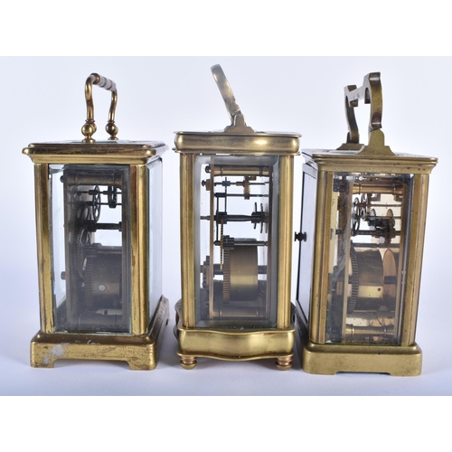 558 - THREE ANTIQUE FRENCH BRASS CARRIAGE CLOCKS 14.25cm high inc handle. (3)