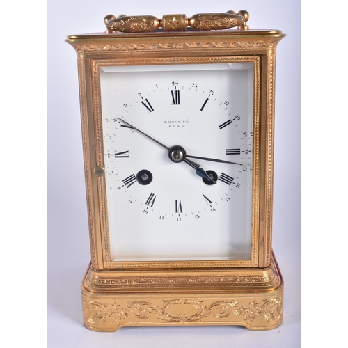 564 - A LARGE ANTIQUE FRENCH CARRIAGE CLOCK with finely engraved case. 22.5 cm high inc handle.