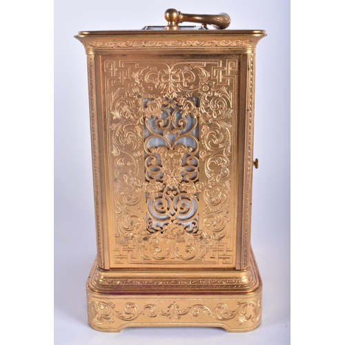 564 - A LARGE ANTIQUE FRENCH CARRIAGE CLOCK with finely engraved case. 22.5 cm high inc handle.