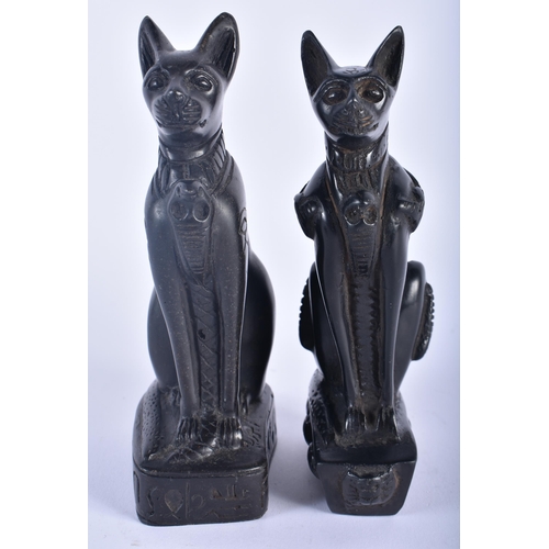 566 - AN ANTIQUE EGYPTIAN REVIVAL BRONZE SPHINX together with a pair of cats. Largest 16 cm high. (3)