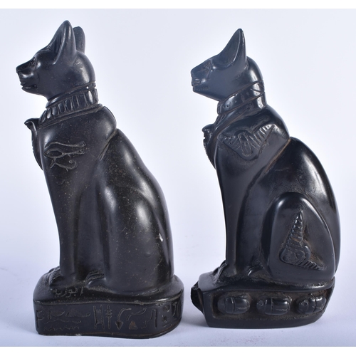 566 - AN ANTIQUE EGYPTIAN REVIVAL BRONZE SPHINX together with a pair of cats. Largest 16 cm high. (3)