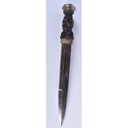 574 - AN ANTIQUE SCOTTISH DIRK DAGGER with white metal mounts. 44 cm long.