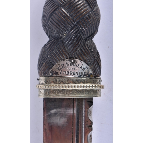 575 - AN ANTIQUE SCOTTISH DIRK DAGGER inset with cairngorms. 44 cm long.