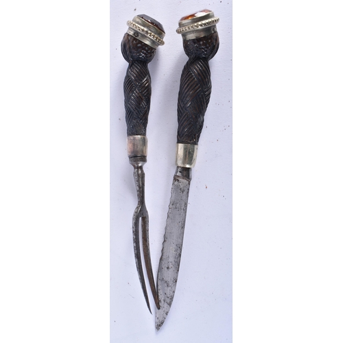 575 - AN ANTIQUE SCOTTISH DIRK DAGGER inset with cairngorms. 44 cm long.