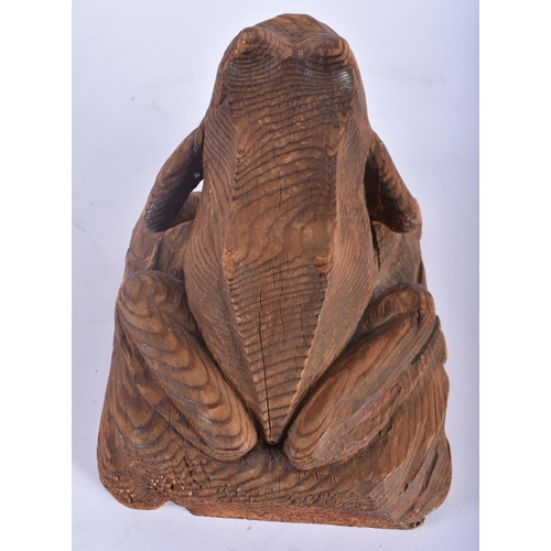 603 - A MOUSEMAN STYLE CARVED PINE FIGURE OF A FROG. 20 cm x 14 cm.