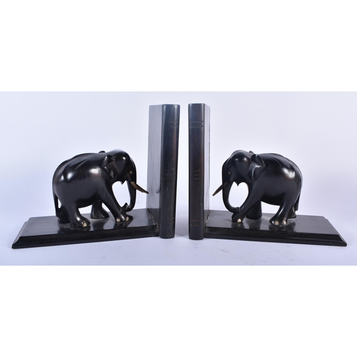 607 - A SET OF FIVE ANTIQUE ASIAN REPOUSSE BOWLS together with a pair of Anglo Indian elephant bookends. L... 