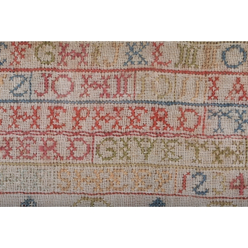 621 - A MID 19TH CENTURY FRAMED EMBROIDERED SAMPLER by Isabella Henry 1844. 42 cm x 32 cm.