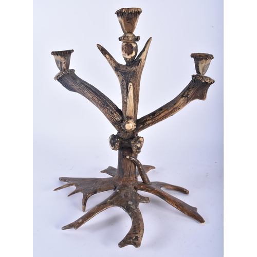 628 - A LARGE ANTIQUE HUNTING LODGE ANTLER HORN CANDELABRA. 37 cm x 14 cm.