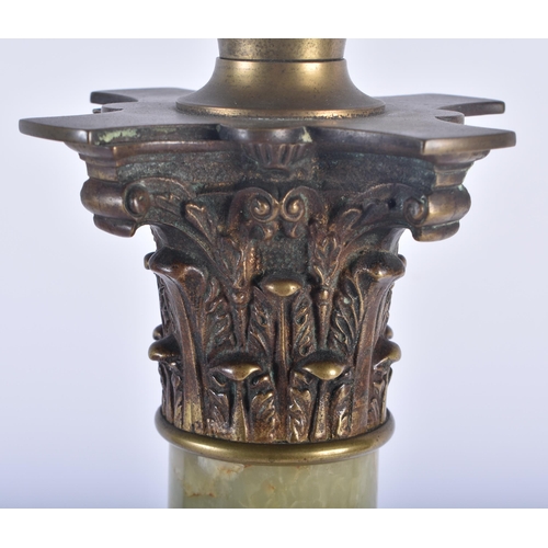 637 - A LARGE 19TH CENTURY EUROPEAN ONYX AND BRONZE COUNTRY HOUSE OIL LAMP. 80 cm high.