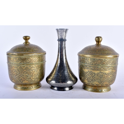 640 - A 19TH CENTURY MIDDLE EASTERN SILVER INLAID BIDRI WARE VASE together with a pair of engraved bronze ... 