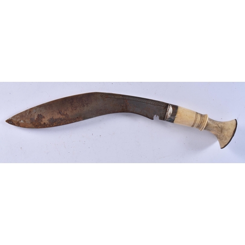 647 - FOUR MIDDLE EASTERN KUKRI TYPE KNIVES. Largest 48 cm long. (4)