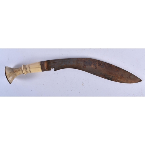 647 - FOUR MIDDLE EASTERN KUKRI TYPE KNIVES. Largest 48 cm long. (4)