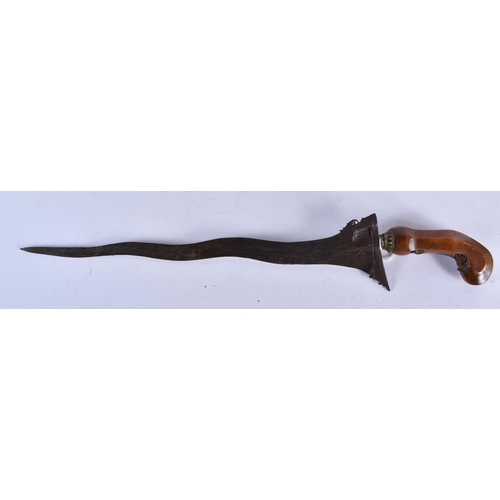 647 - FOUR MIDDLE EASTERN KUKRI TYPE KNIVES. Largest 48 cm long. (4)