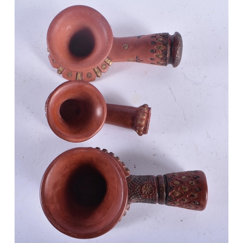 651 - THREE TURKISH OTTOMAN TOPHANE POTTERY PIPES. 10 cm long. (3)