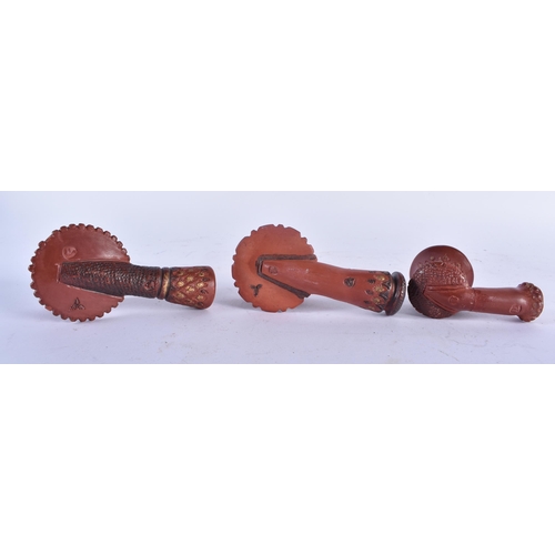 651 - THREE TURKISH OTTOMAN TOPHANE POTTERY PIPES. 10 cm long. (3)