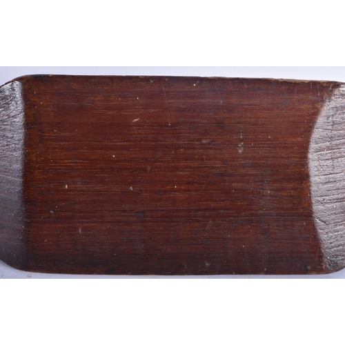 661 - A TRIBAL CARVED WOOD CLUB. 64 cm long.