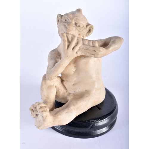 684 - A MARTIN BROTHERS FIGURE OF AN IMP MUSICIAN. 13 cm x 7 cm.