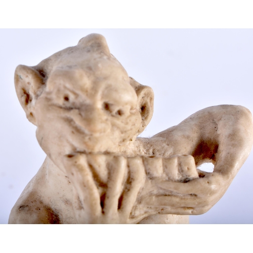 684 - A MARTIN BROTHERS FIGURE OF AN IMP MUSICIAN. 13 cm x 7 cm.