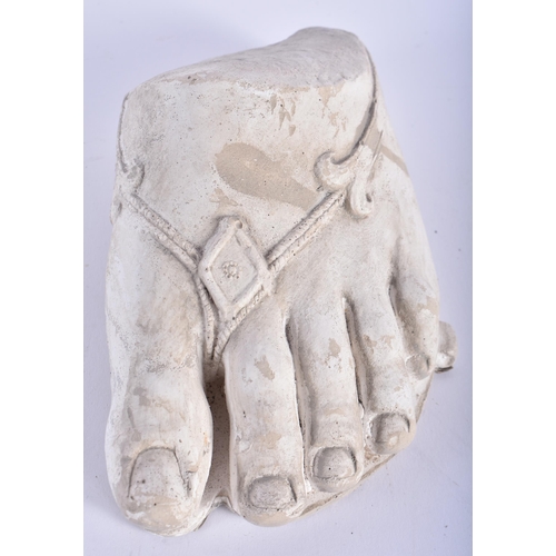 688 - A GRAND TOUR STYLE COUNTRY HOUSE PLASTER FOOT PAPER WEIGHT. 17 cm x 10 cm.