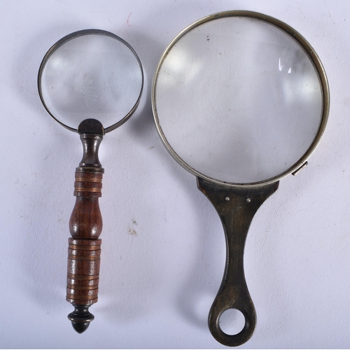 693 - TWO ANTIQUE MAGNIFYING GLASSES. Largest 15 cm long. (2)