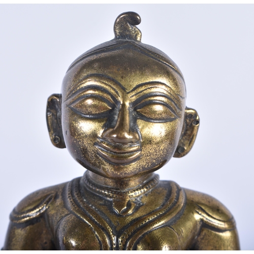 694 - AN 18TH/19TH CENTURY INDIAN BRONZE FIGURE OF A HINDU DEITY. 19 cm high.