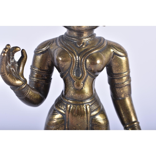 694 - AN 18TH/19TH CENTURY INDIAN BRONZE FIGURE OF A HINDU DEITY. 19 cm high.