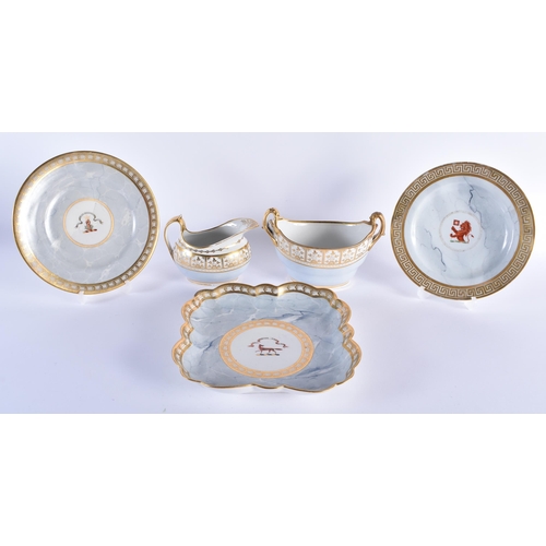 7 - A LATE 18TH CENTURY GROUP OF BARR FLIGHT AND BARR PORCELAIN WARES painted with armorials on a marble... 