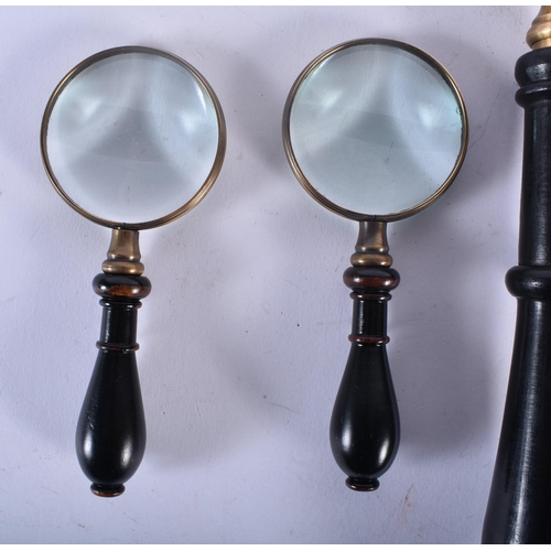 700 - FOUR MAGNIFYING GLASSES. Largest 34 cm long. (4)