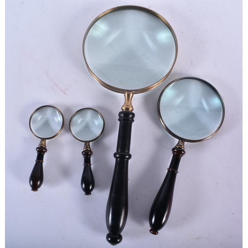 700 - FOUR MAGNIFYING GLASSES. Largest 34 cm long. (4)