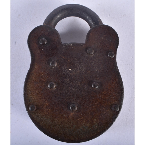 702 - A PAIR OF ANTIQUE HANDCUFFS together with a similar padlock. Largest 24 cm long. (3)