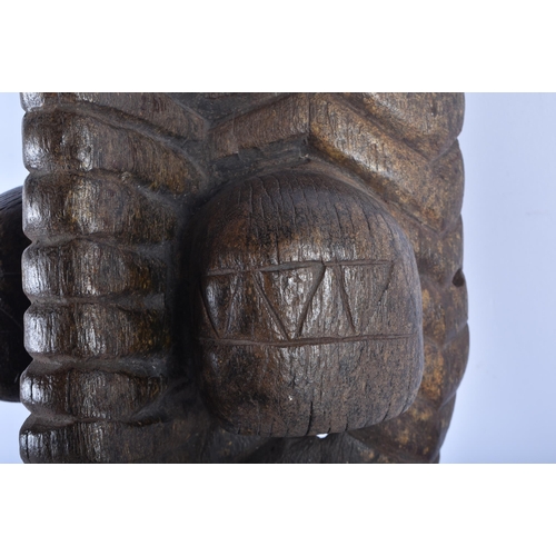 705 - A LARGE AFRICAN TRIBAL CARVED WOOD MASK. 45cm x 15 cm.