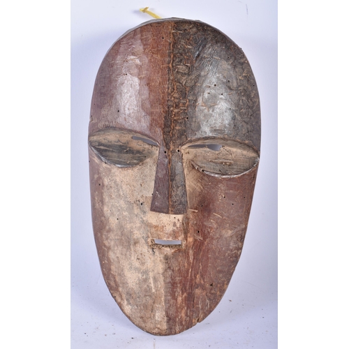 708 - AN AFRICAN TRIBAL CARVED WOOD MASK. 28 cm x 14 cm.