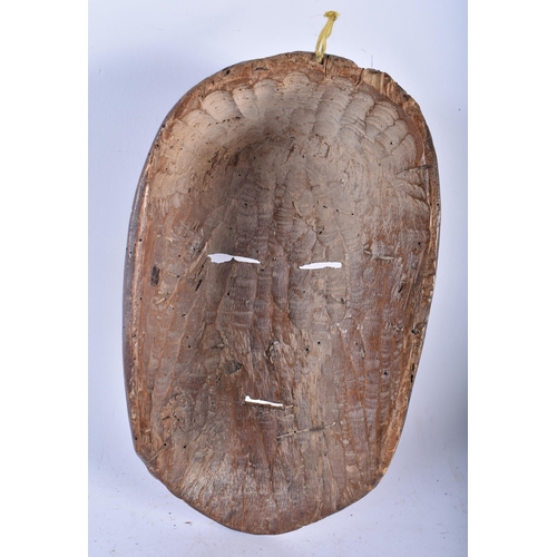 708 - AN AFRICAN TRIBAL CARVED WOOD MASK. 28 cm x 14 cm.