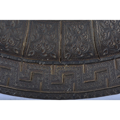 712 - AN UNUSUAL LARGE 18TH/19TH CENTURY MIDDLE EASTERN ISLAMIC BRONZE CHARGER decorated all over with geo... 