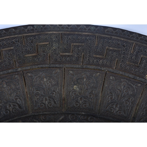 712 - AN UNUSUAL LARGE 18TH/19TH CENTURY MIDDLE EASTERN ISLAMIC BRONZE CHARGER decorated all over with geo... 