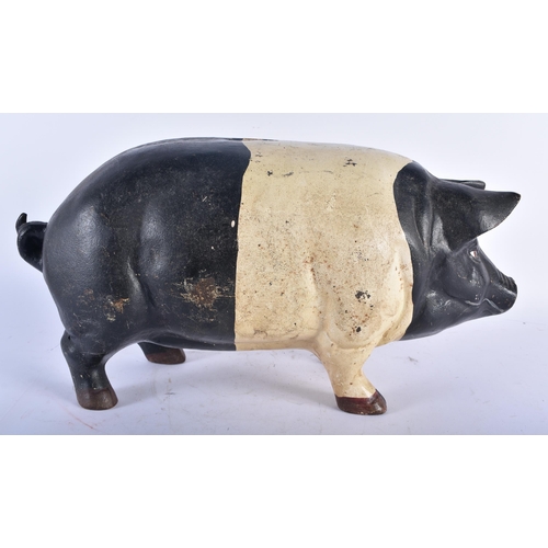 713 - A CHARMING LARGE COLD PAINTED CAST IRON FOLK ART PIG MONEY BOX. 45cm x 18cm.