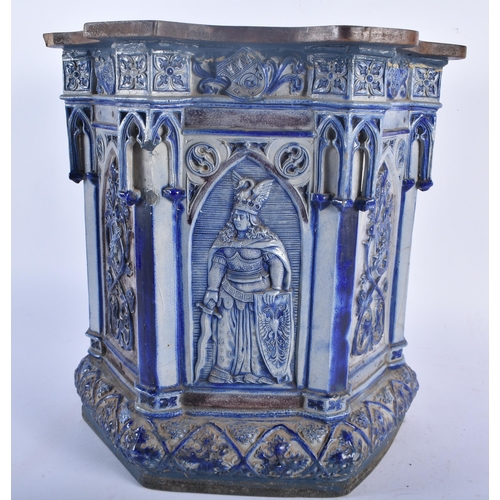 717 - A RARE 19TH CENTURY GERMAN SALT GLAZED STONEWARE TURRET decorated with various soldiers and figures ... 