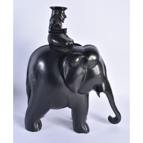 72 - A LARGE 19TH CENTURY ANGLO INDIAN CARVED EBONY FIGURE together with an African hardwood rhinoceros. ... 