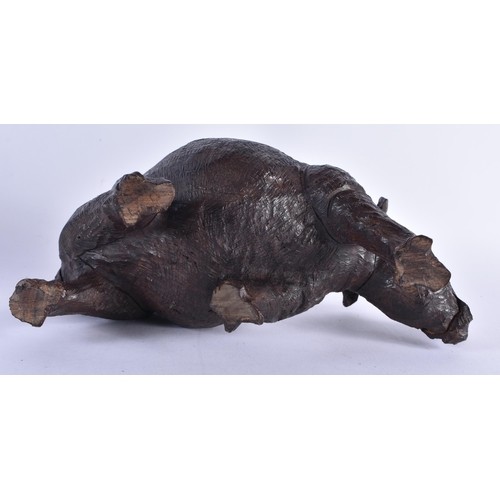 72 - A LARGE 19TH CENTURY ANGLO INDIAN CARVED EBONY FIGURE together with an African hardwood rhinoceros. ... 