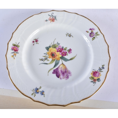 721 - A SET OF TEN DANISH ROYAL COPENHAGEN PORCELAIN SCALLOPED DISHES painted with flowers. 21 cm wide. (1... 